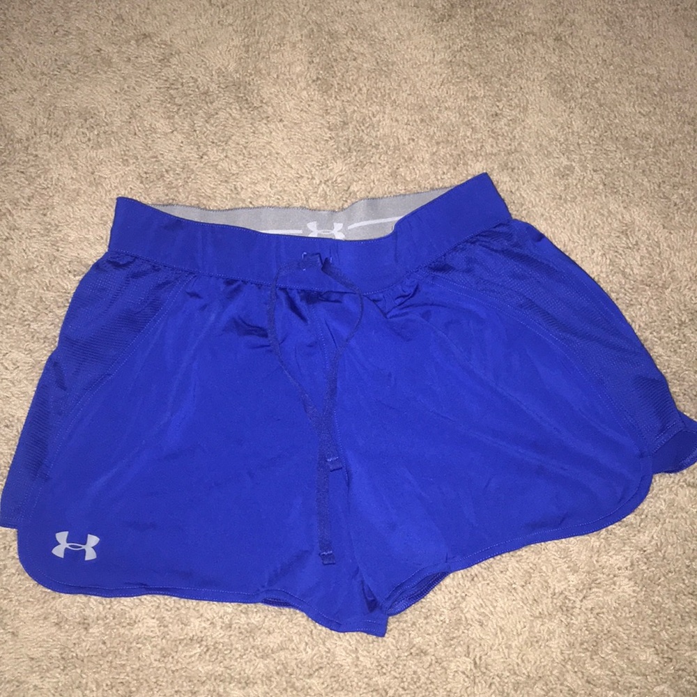 Blue UA athletic shorts